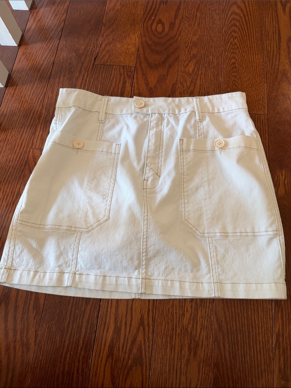 High-Waist Cream Mini Skirt with Front Patch Pockets